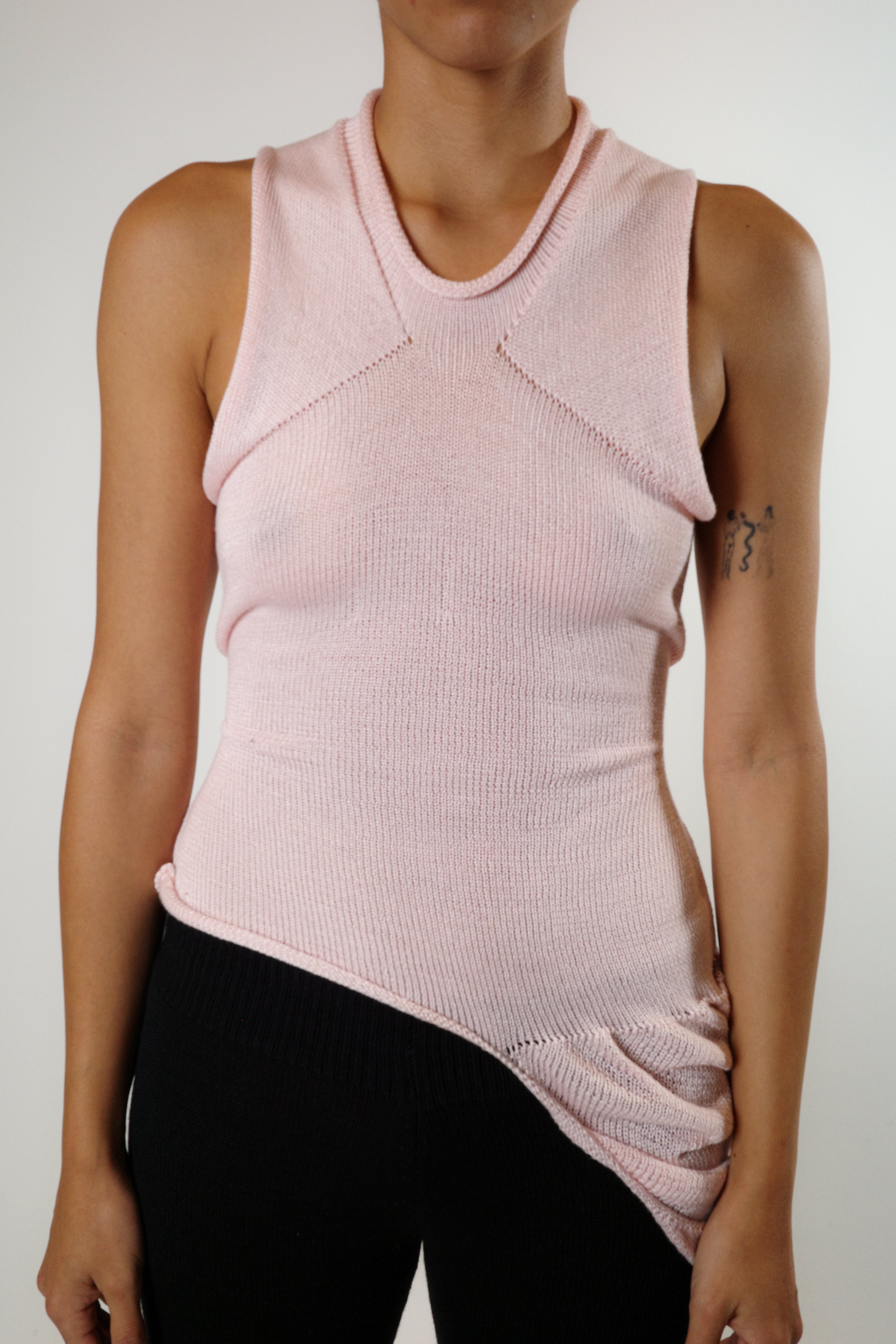 Pink bamboo cotton knit top with draped side detailing and adjustable ties